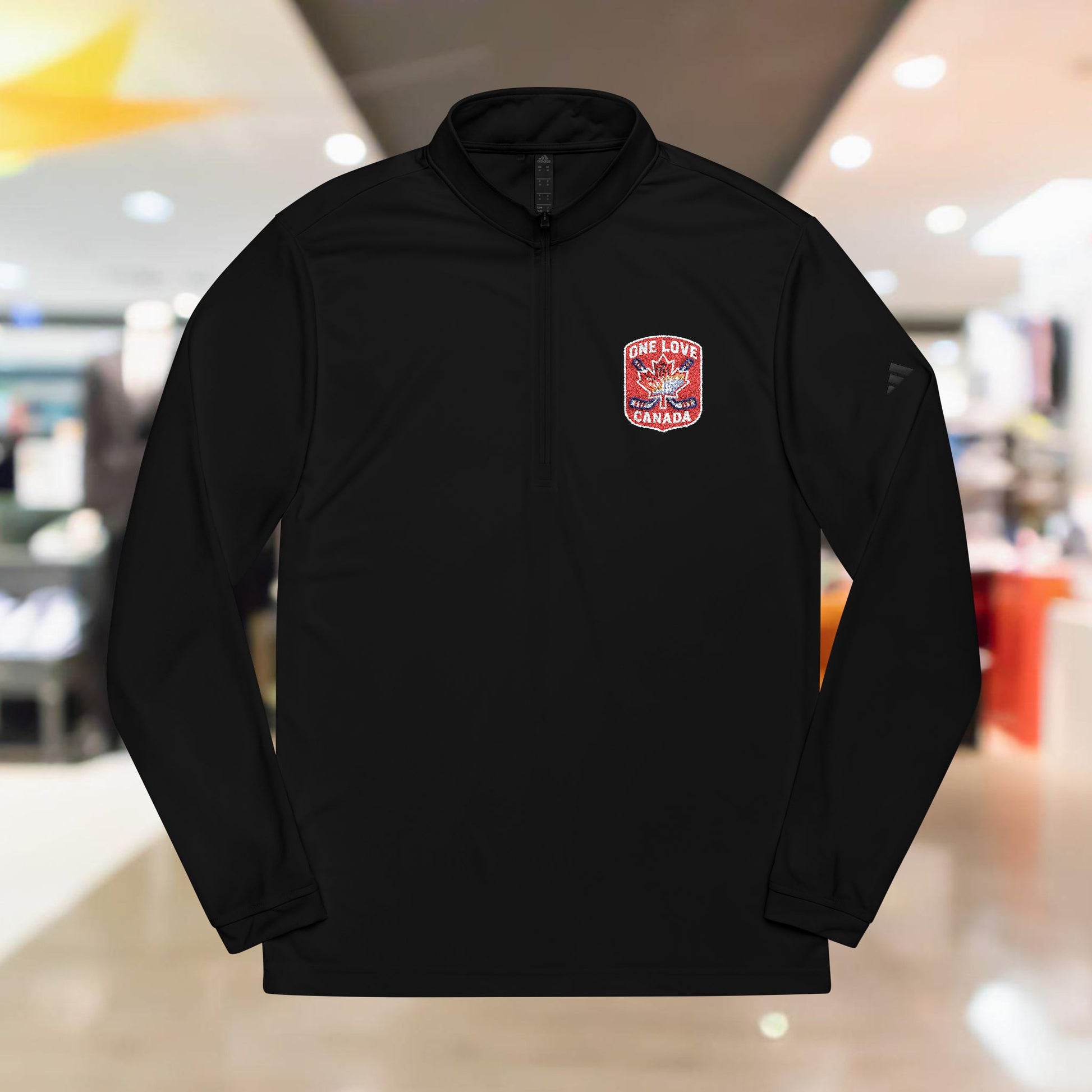 Adidas® Quarter-Zip Pullover with Embroidered Design - OneLoveCanada