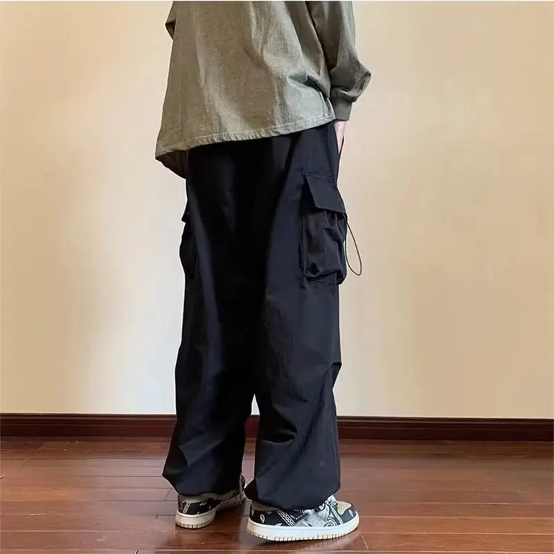 2025 New Men's Overalls Multi-Pocket American Hiphop Pants Men's Ins High Street Spring And Autumn Bunched Foot Assault Pants