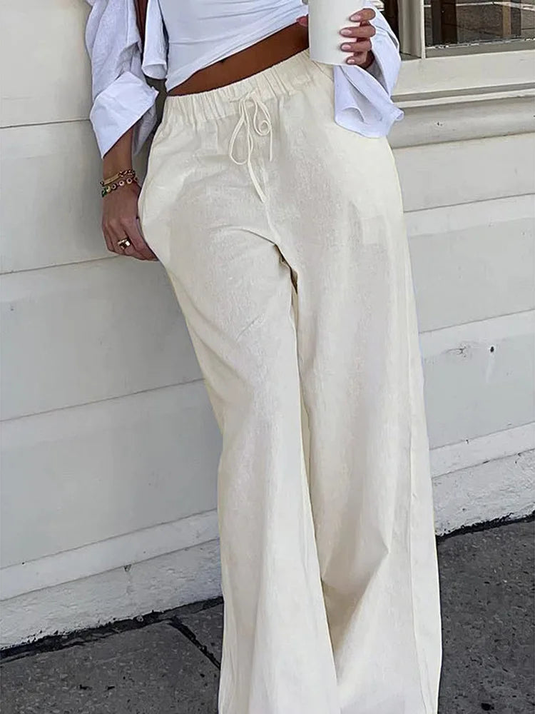 Women's simple soild-color drawstring casual pants,They are loose,trendy,straight-tube style,lazy and comfortable.