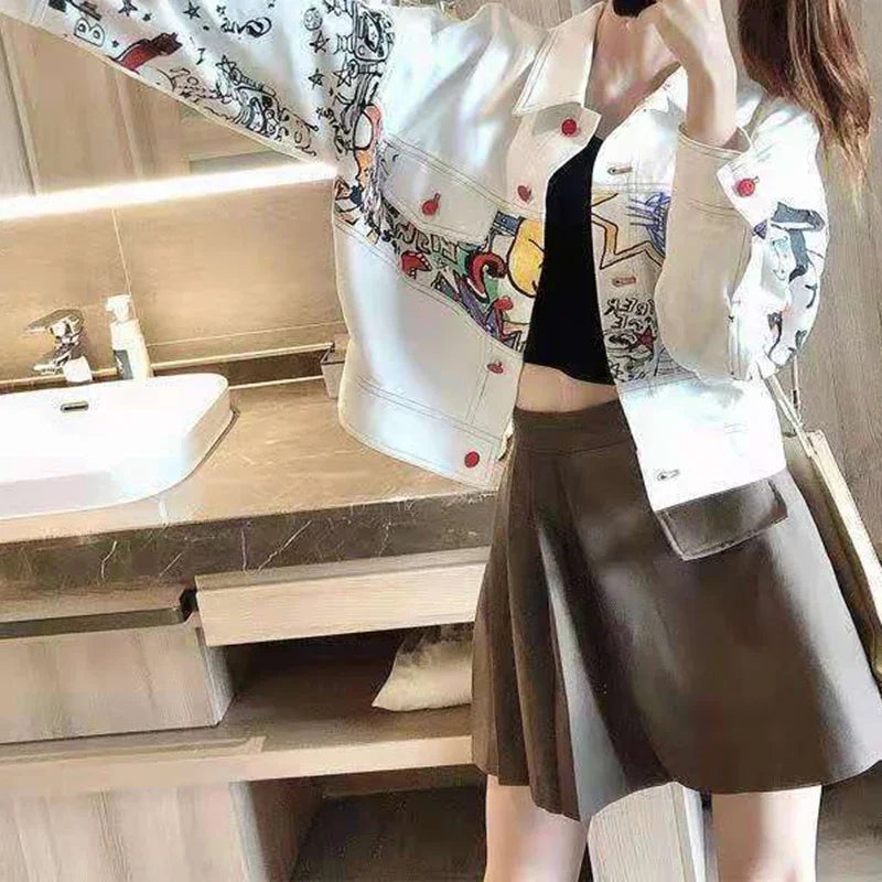 Denim jacket women's autumn and winter new style graffiti work jacket fashion temperament loose Korean college style short coat.